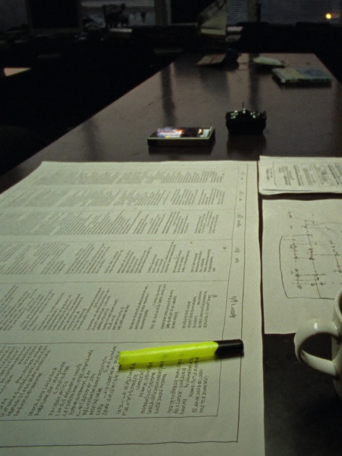 A planning table at dawn with a printed lead list and a routing sketch